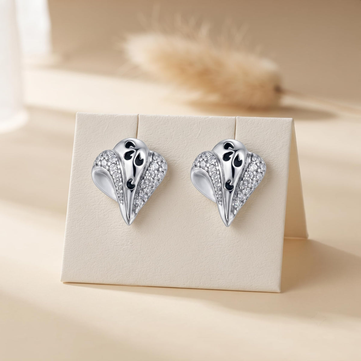 Black Swirl Leaf 925 silver stud earrings for women, office wear, side angle view