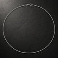 925 sterling silver rhodium-plated chain by Silvme, weighing about 5.05 g, clasp included