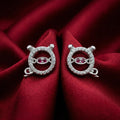 Purple-Centre Spiral Stud Earrings, close-up detail