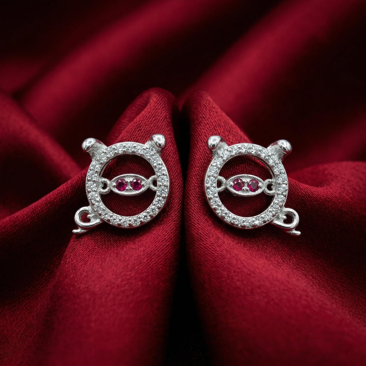 Purple-Centre Spiral Stud Earrings, close-up detail