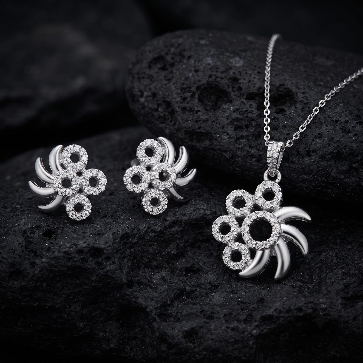 Silvme pure 925 sterling silver pinwheel pendant and stud earrings set with cubic zirconia, styled setting image