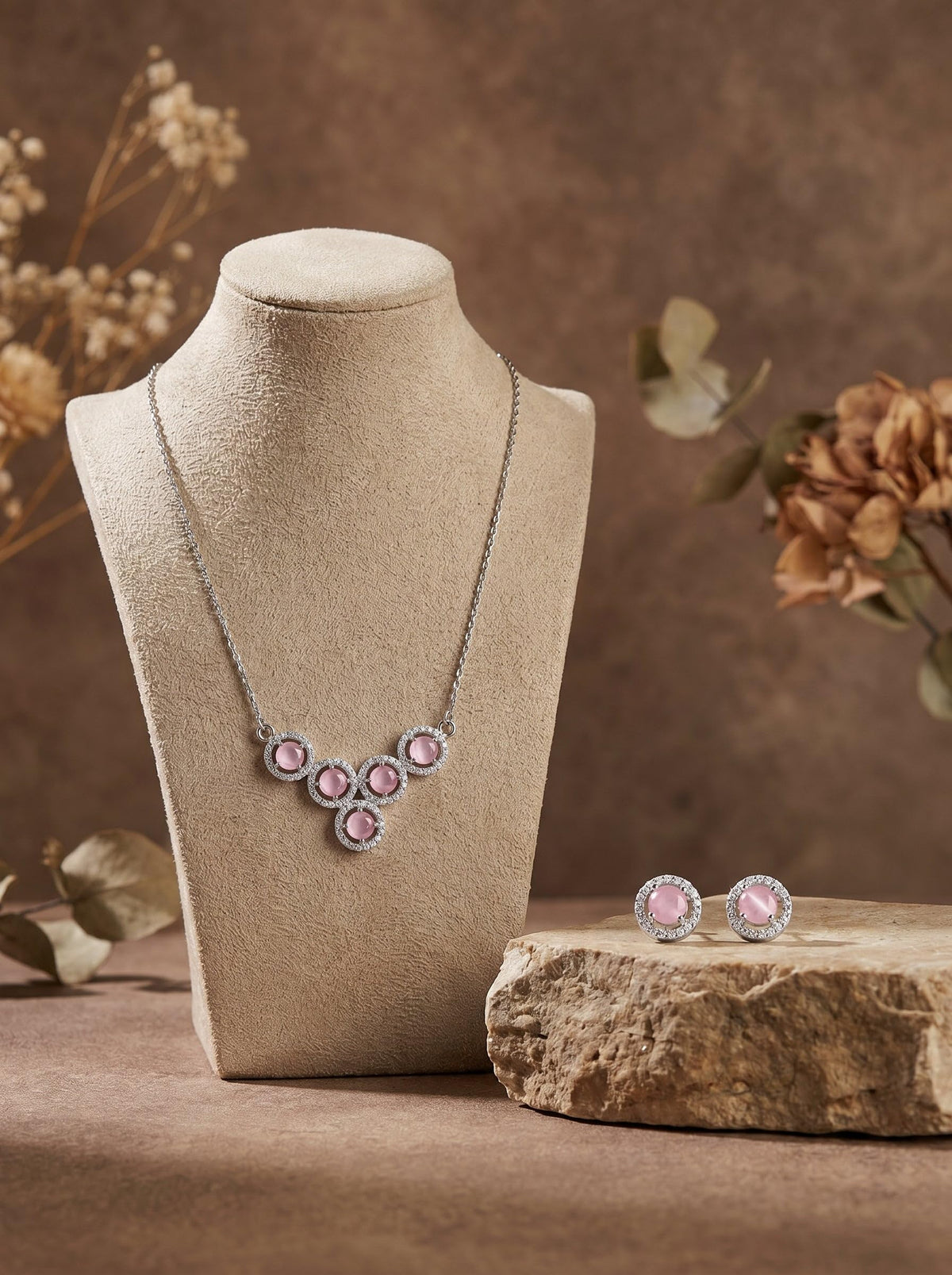 Silvme 925 silver pink cluster pendant necklace and stud earrings with pink cubic zirconia, side profile view