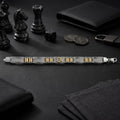 Link pattern and surface detail across the two-tone bar link bracelet by Silvme