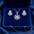 Floral Flower 925 sterling silver pendant and stud earrings jewellery set with cubic zirconia by Silvme â€” styled setting image