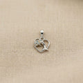 Smooth polished silver surface of the Silvme Dolphin Heart Pendant, premium 925 sterling silver