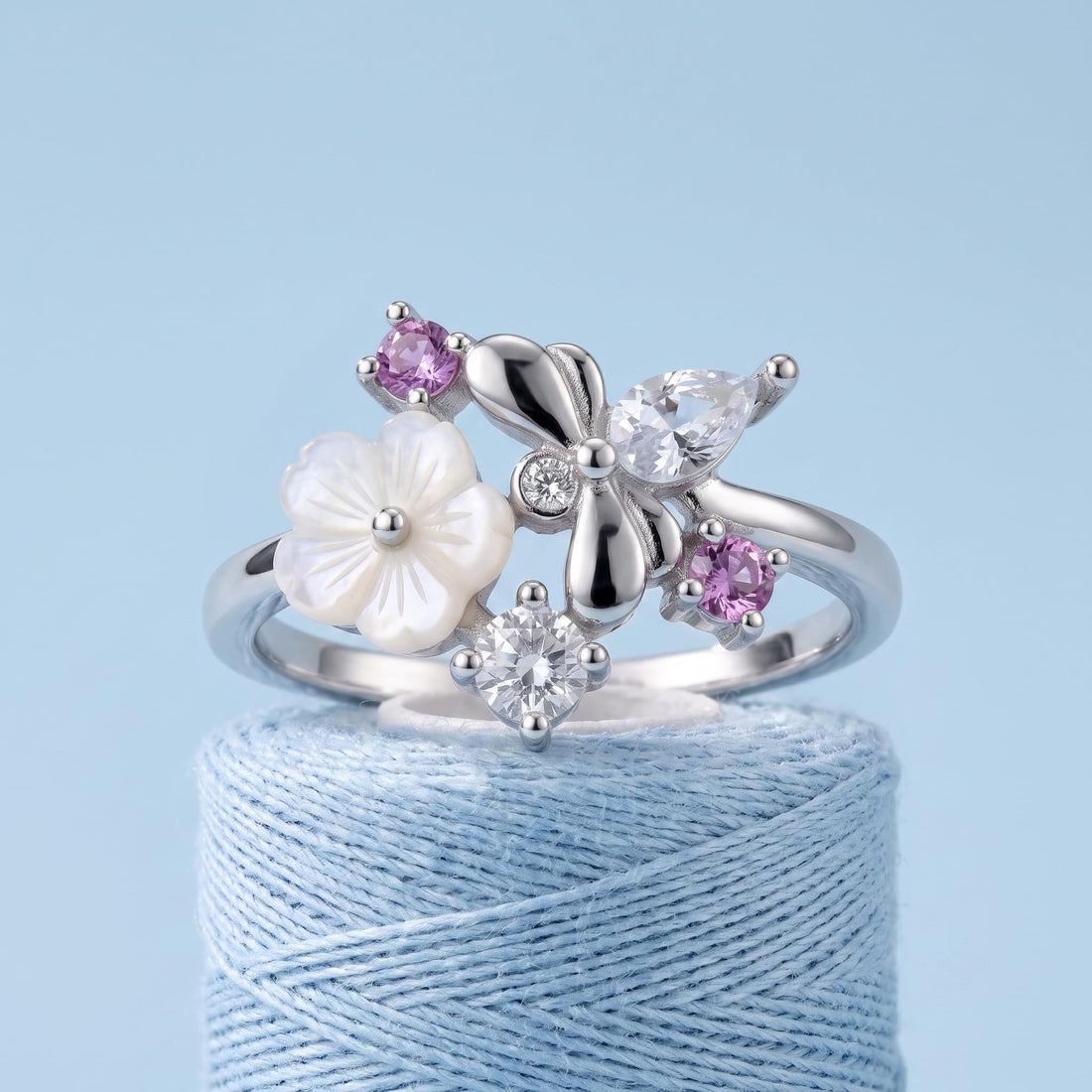 Silvme Bow Botanical Cluster 925 sterling silver ring for women with a pearl-effect accent — front view on white background