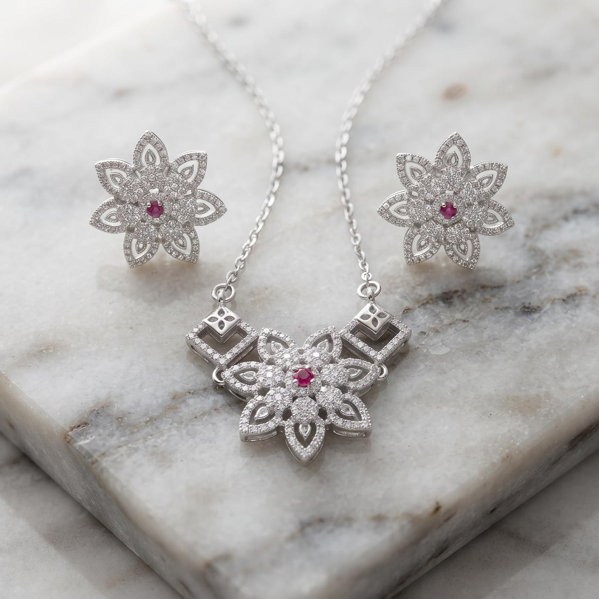 Silvme pure 925 sterling silver sparkling cubic zirconia pendant necklace and stud earrings set with cubic zirconia, front view of the complete set