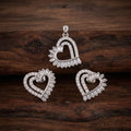 Silvme pure 925 sterling silver baguette heart pendant and stud earrings set with cubic zirconia, styled flatlay view