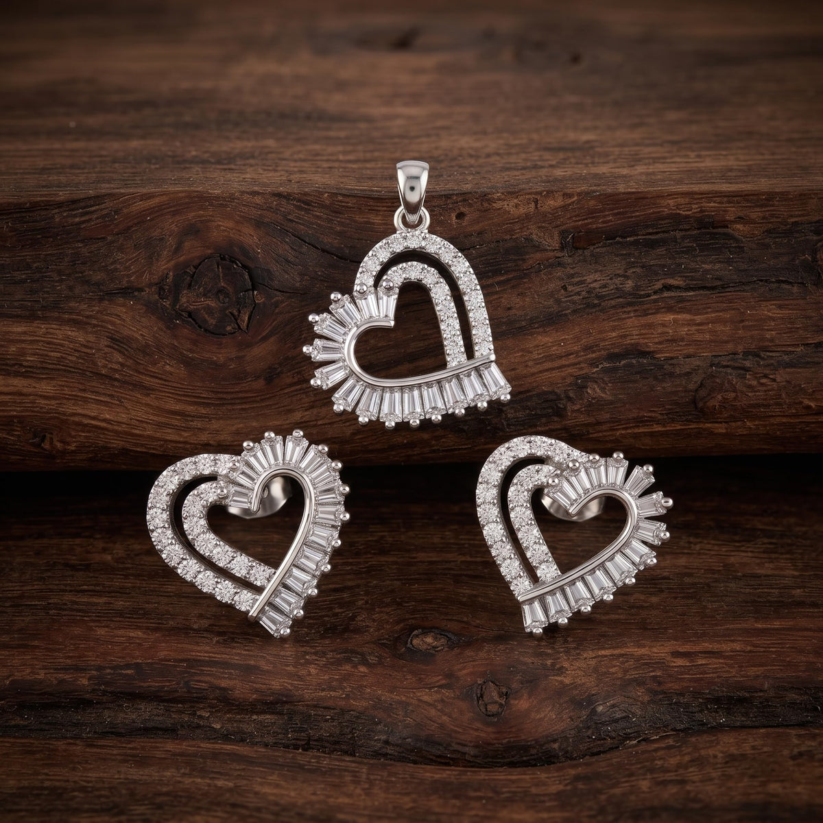 Silvme pure 925 sterling silver baguette heart pendant and stud earrings set with cubic zirconia, styled flatlay view