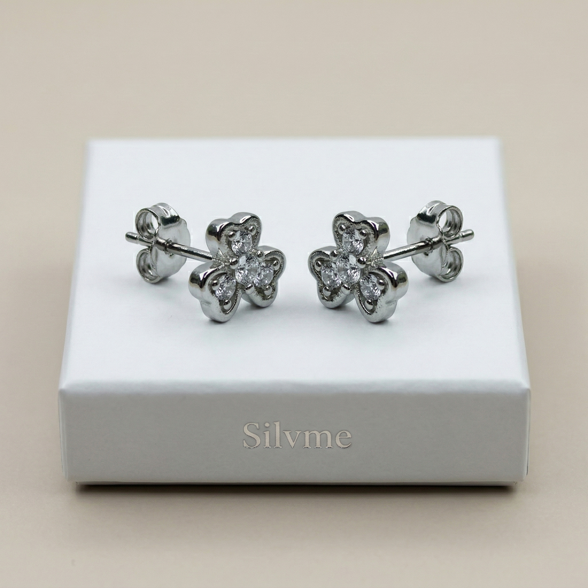 Heart-Shaped Floral Stud Earrings with Detailing, close-up detail