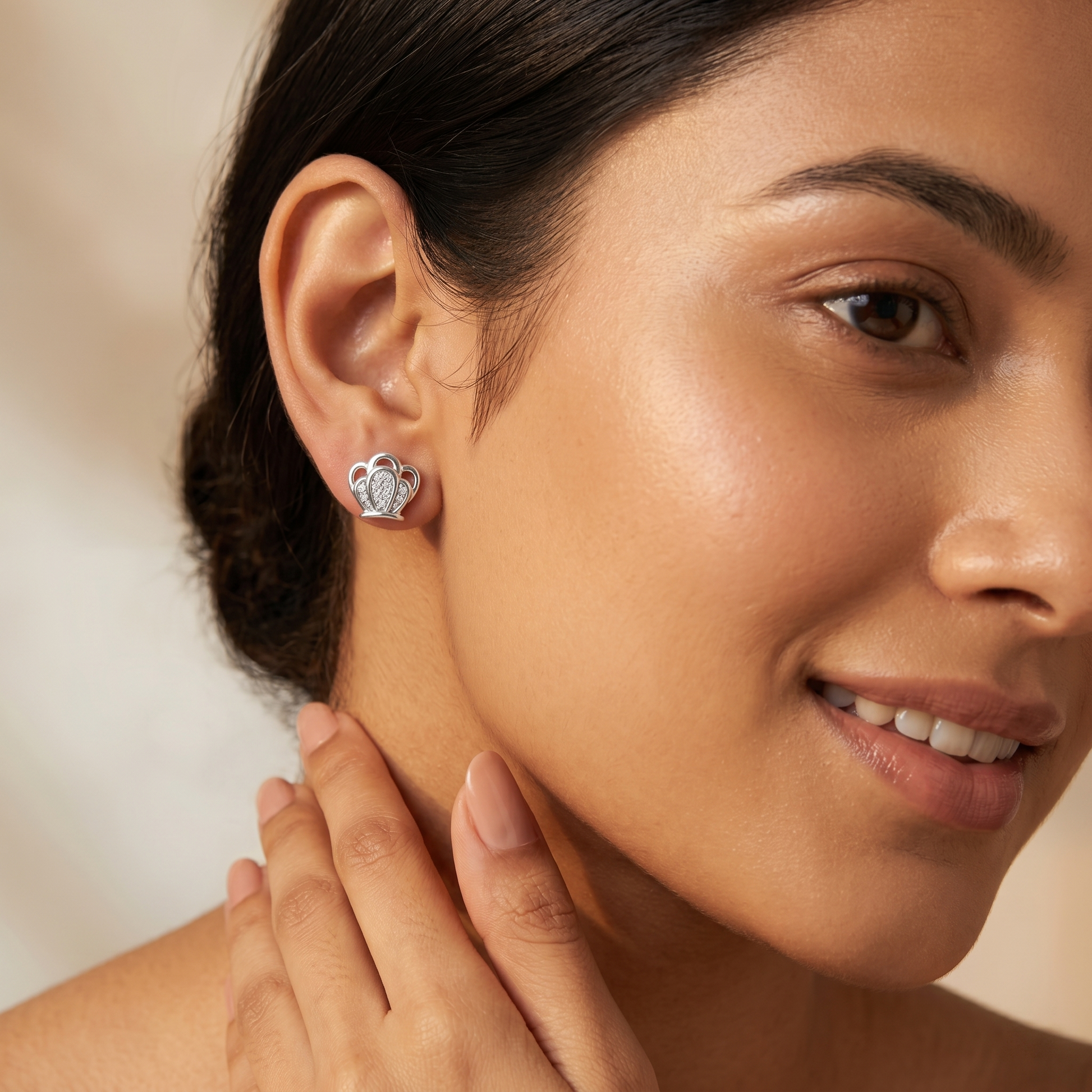 Crown-Shaped PavÃ© Stone-Set Stud Earrings, close-up detail