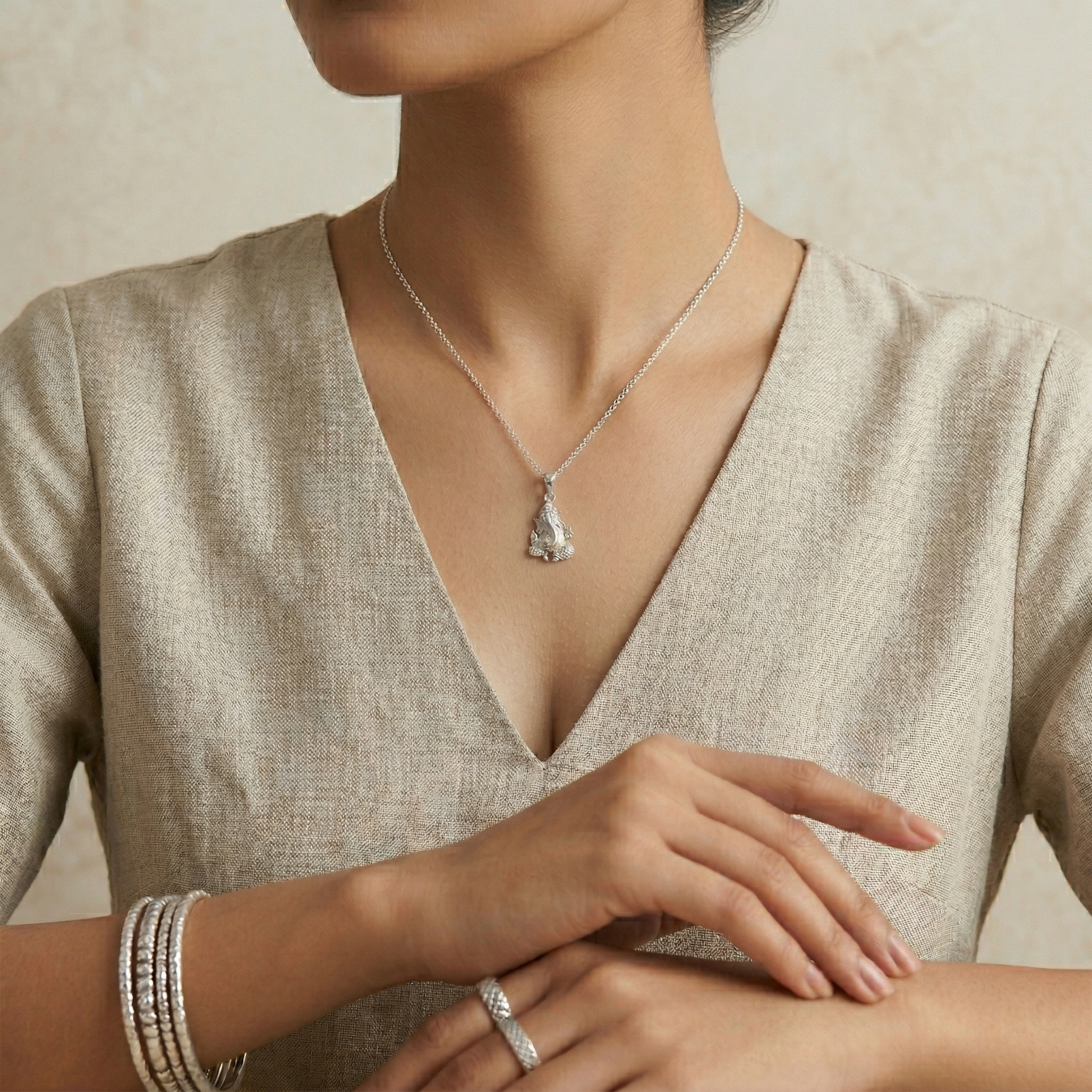 Silvme Ganesh Idol Pendant showcasing its ganesh idol design in 925 sterling silver for women