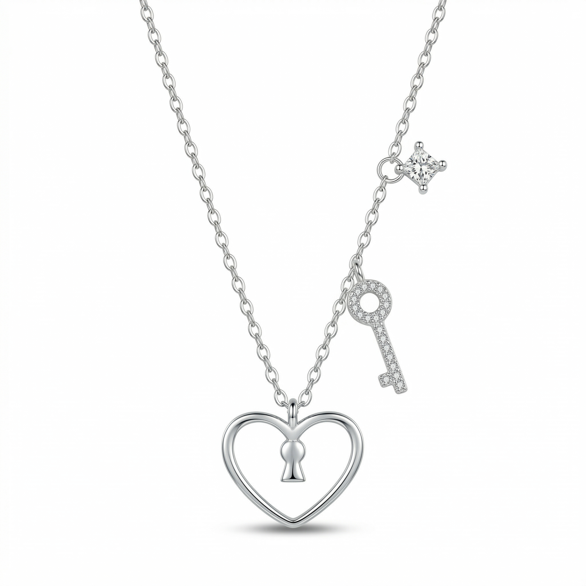 A silver necklace featuring a heart-shaped pendant with a keyhole in the center, a dangling key charm, and a small star-shaped accent, shown on a clean white background.