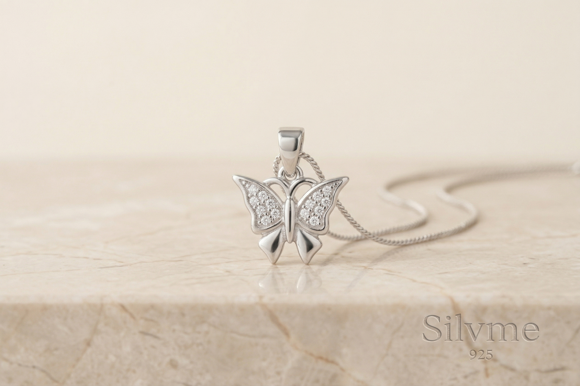 Detailed butterfly wings styling on the Silvme Butterfly Wings Pendant in polished 925 silver