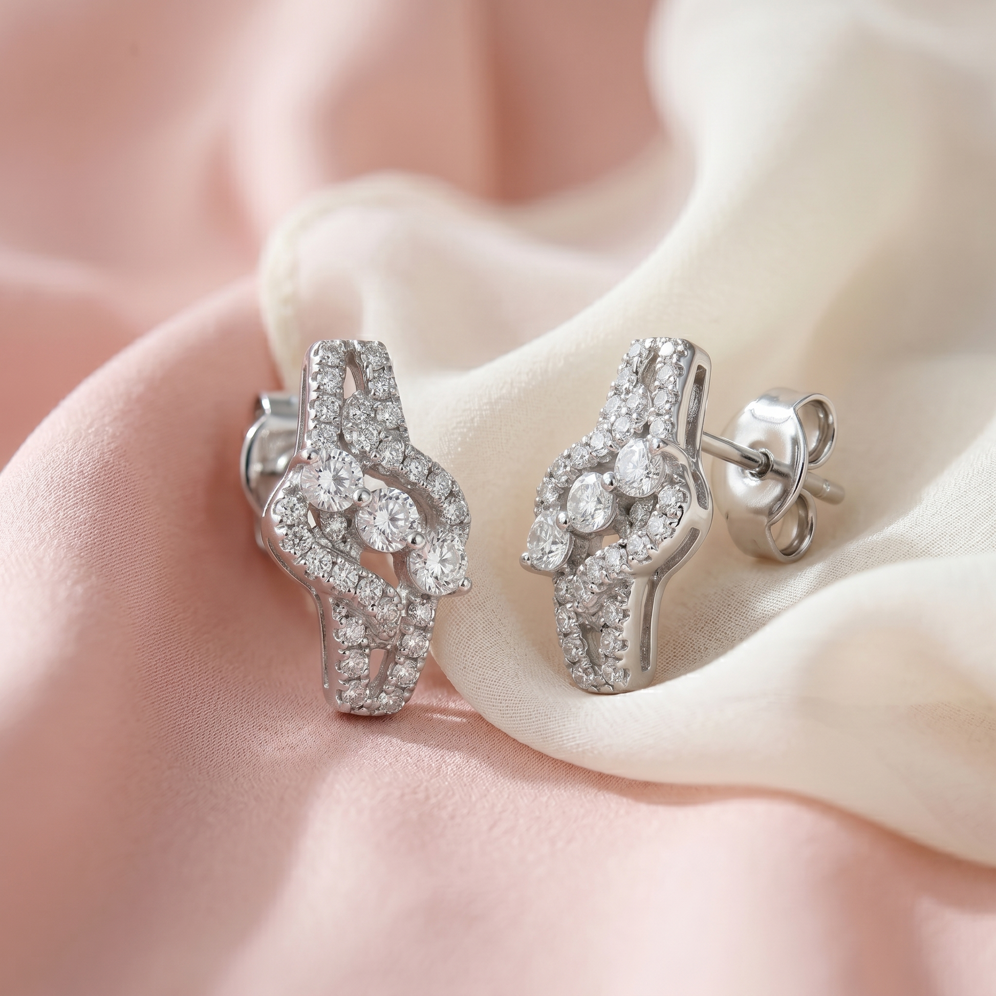 Three Stone Stone-Set Bypass Stud Earrings, close-up detail
