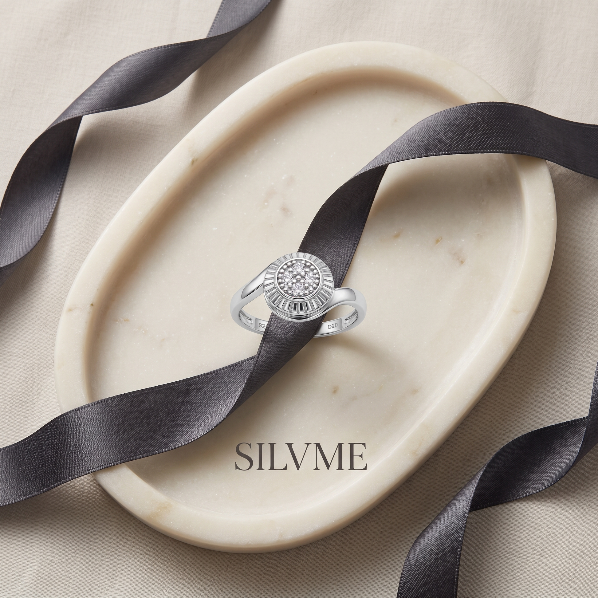 Silvme Sunburst Medallion Cluster 925 sterling silver ring for women set with cubic zirconia — close-up detail