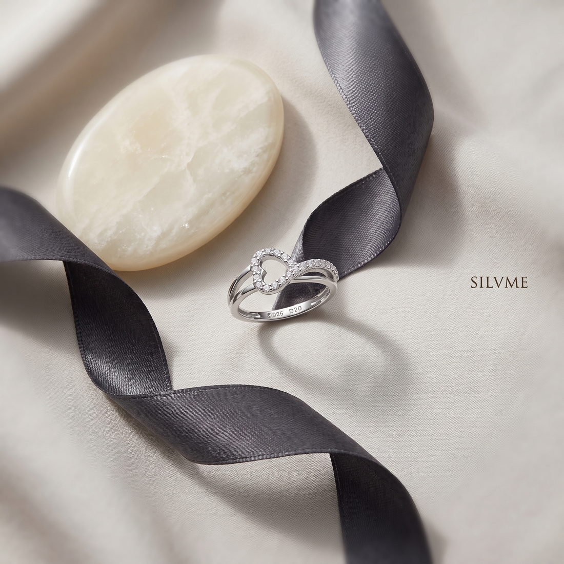 Silvme Heart Infinity 925 sterling silver ring for women set with cubic zirconia — front view on white background
