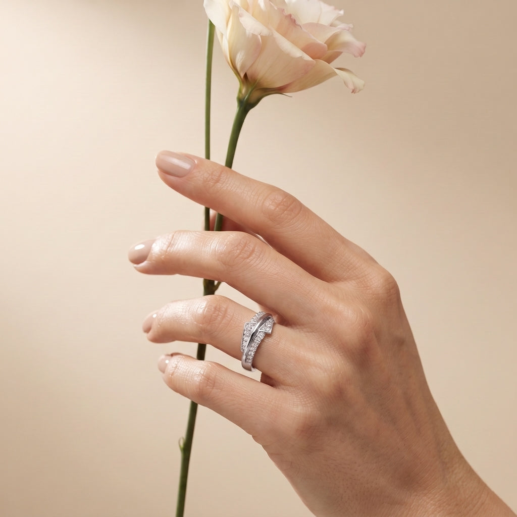 Silvme Triple Ribbon Crossover 925 sterling silver ring for women set with cubic zirconia — studio detail shot