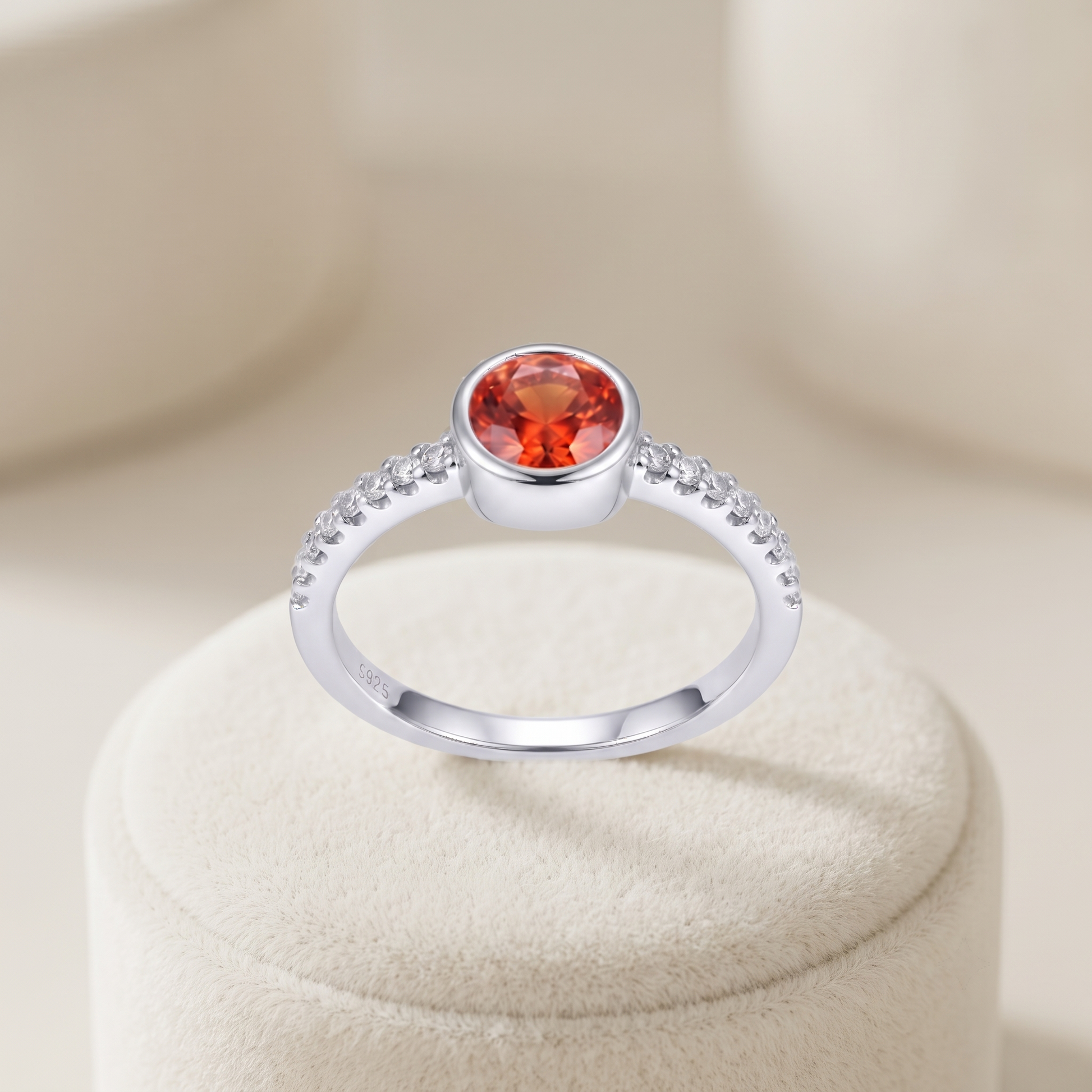 Silvme Orange-Red Bezel Solitaire 925 sterling silver ring for women set with cubic zirconia — studio detail shot