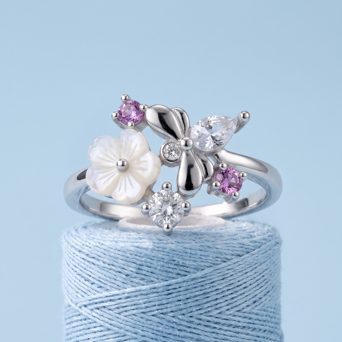 Silvme Bow Botanical Cluster 925 sterling silver ring for women with a pearl-effect accent — front view on white background