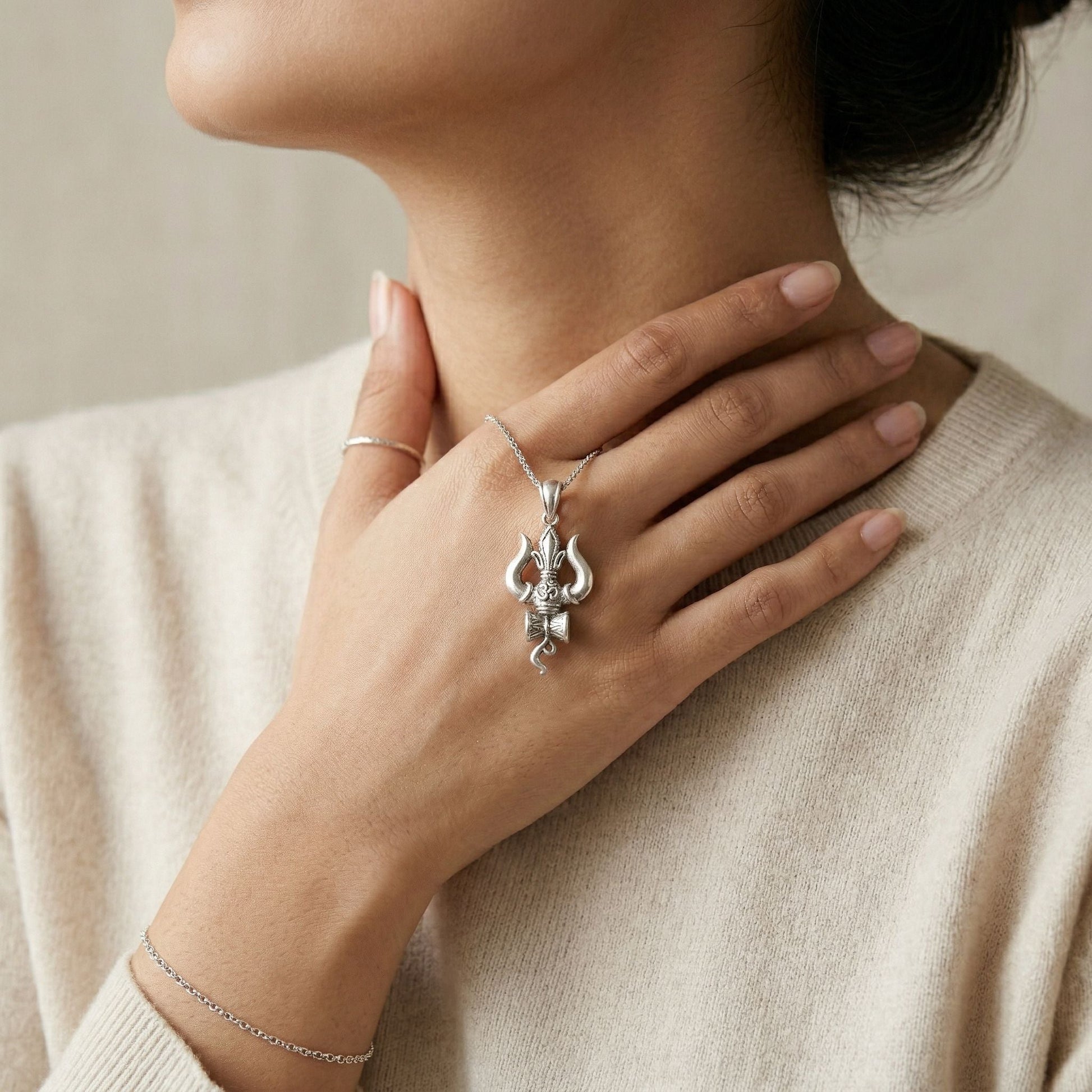 Detailed trishul pendant styling on the Silvme Trishul Pendant in polished 925 silver, ideal for Diwali festive wear