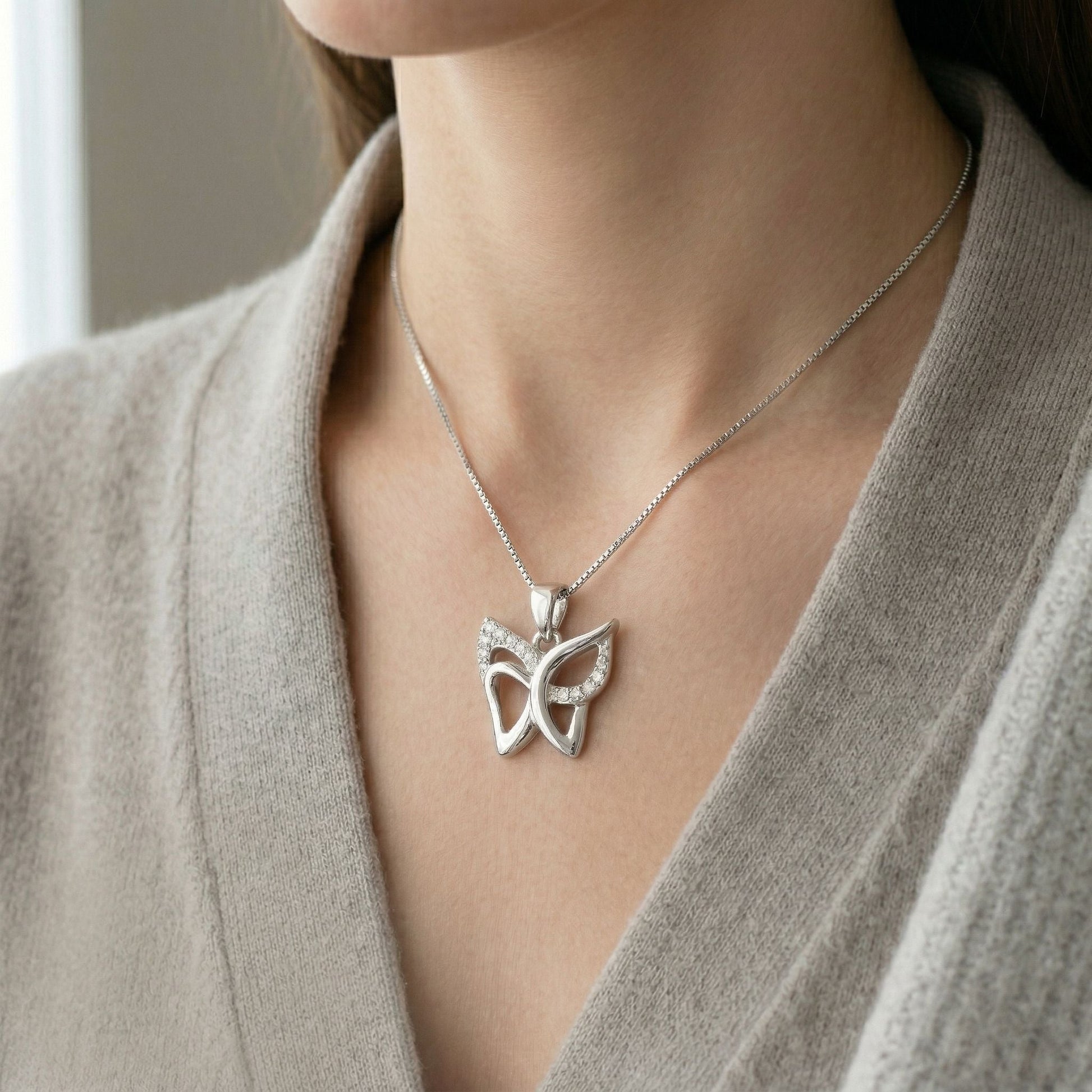 Butterfly Wings design detail on the Silvme Butterfly Wings Pendant, crafted in polished 925 silver
