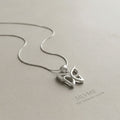 Smooth polished silver surface of the Silvme Butterfly Wings Pendant, premium 925 sterling silver