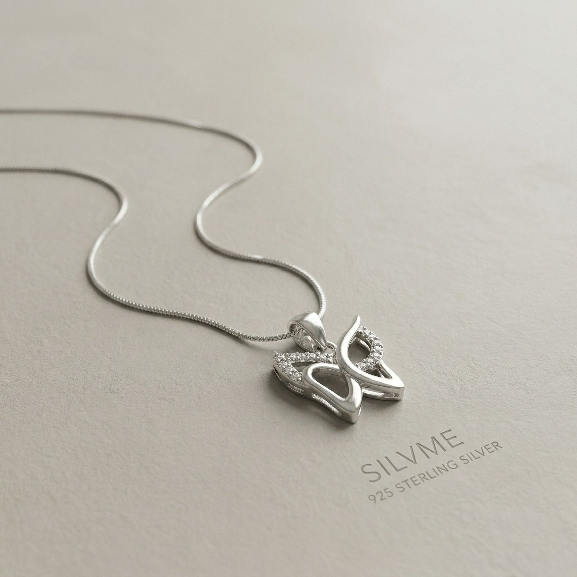 Smooth polished silver surface of the Silvme Butterfly Wings Pendant, premium 925 sterling silver