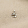 Smooth polished silver surface of the Silvme Dolphin Heart Pendant, premium 925 sterling silver
