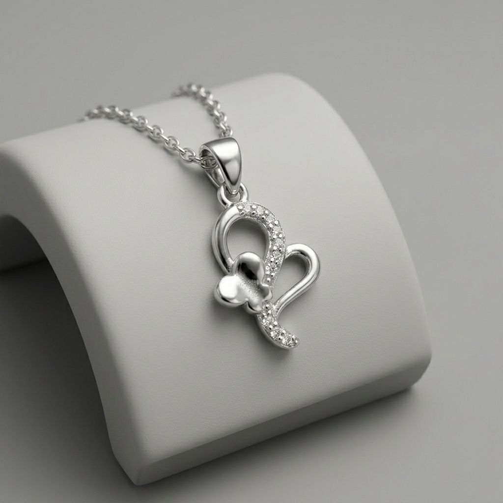 Detailed om pendant styling on the Silvme OM Pendant in polished 925 sterling silver, ideal for festive occasions