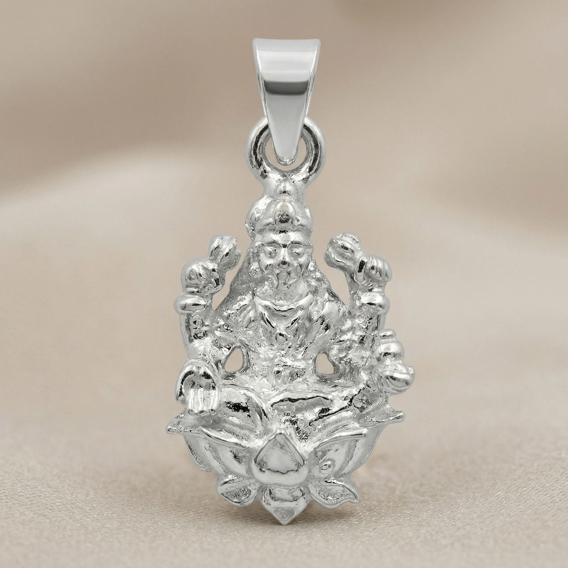 Silvme Devi Lakshmi Pendant showcasing its devi lakshmi design in 925 silver, refined silver accessory