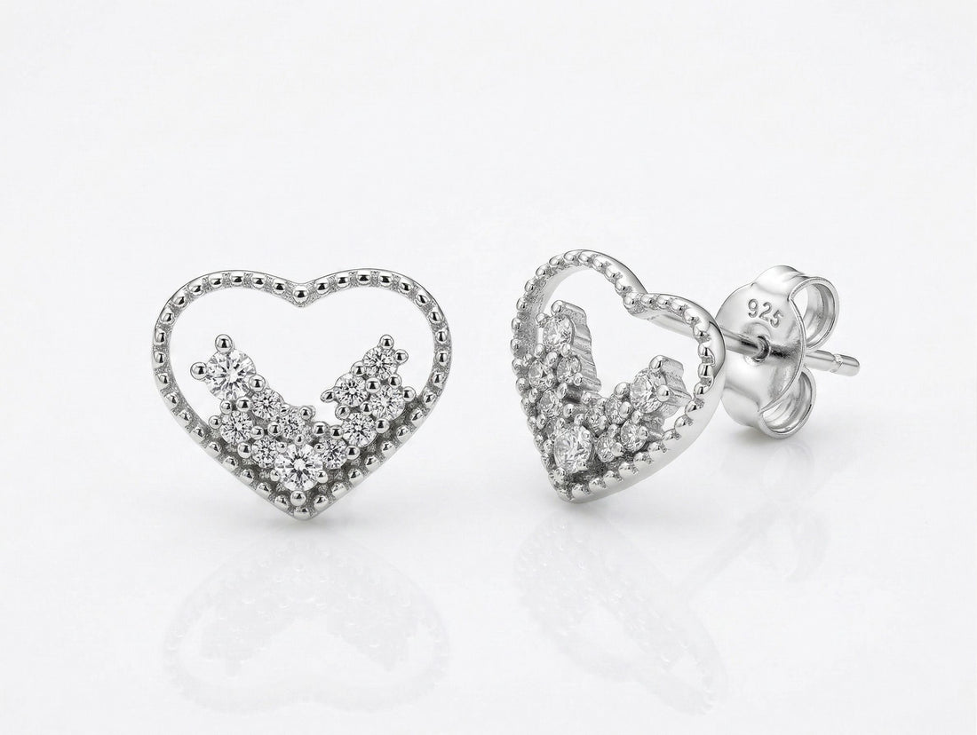925 sterling silver Open-Heart CZ Stud Earrings by Silvme accented with sparkling cubic zirconia, an elegant accessory for her