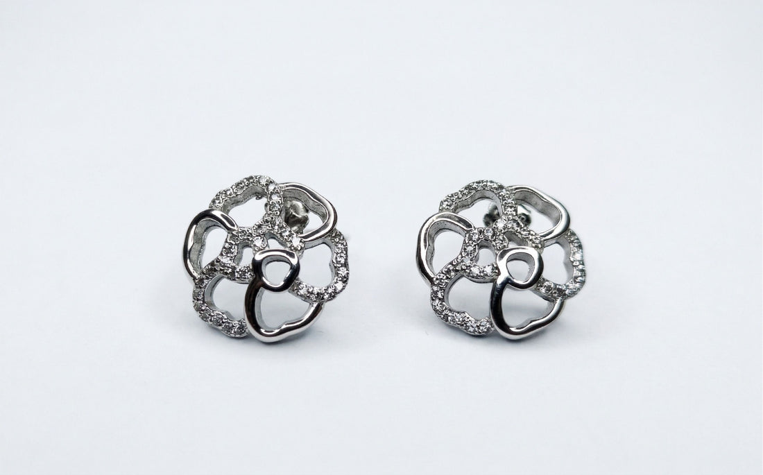 925 sterling silver Open-Petal Camellia CZ Stud Earrings by Silvme set with cubic zirconia, an elegant accessory for her