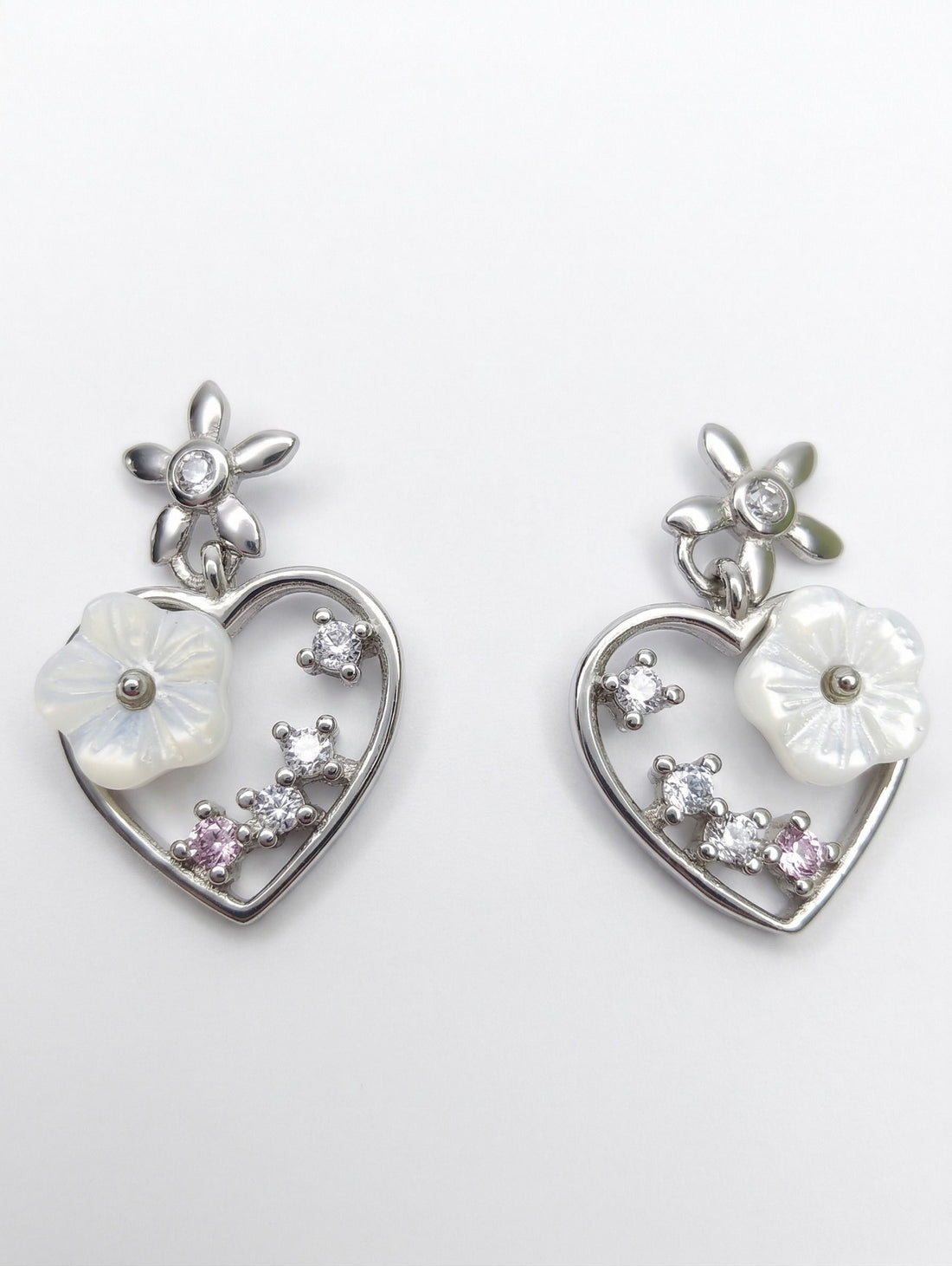 925 sterling silver Heart-Shaped Flower Dangle Drop Earrings by Silvme, an elegant accessory for her
